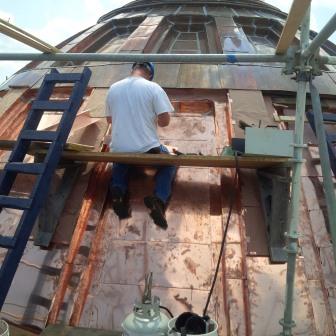 State House Dome, working on side of dome